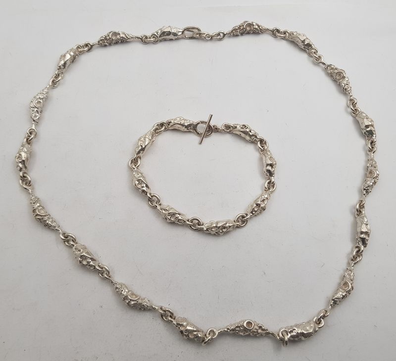 Kjede og armbånd i 925 S fra Juhls.